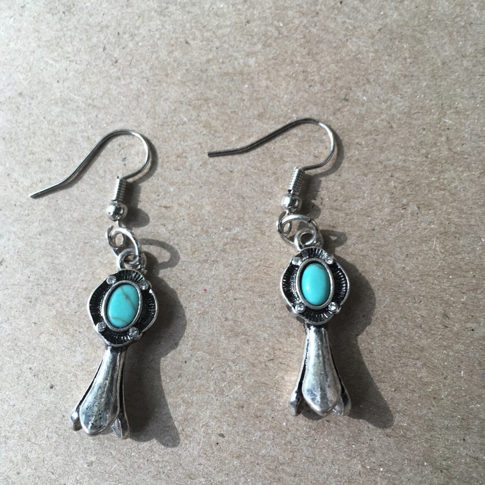 Earrings. Lovely faux turquoise stone w/silvertoned findings. Pierced. Dangles.